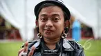 Sejumlah wajah nyentrik bermunculan di acara Indonesia Greaser Party 2015, Plaza Barat Senayan, Jakarta, Minggu (12/4/2015). Body piercing dan tattoo menjadi ciri khas tersendiri. (Liputan6.com/Faizal Fanani)