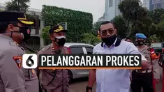 Peserta vaksinasi pegawai BUMN di Istora Senayan, Jakarta (10/3) membludak. Akibatnya terjadi kerumunan dan pelanggaran protokol kesehatan. Polisi yang berjaga sempat ancam bubarkan kegiatan vaksinasi, jika panitia tak benahi antrean peserta.