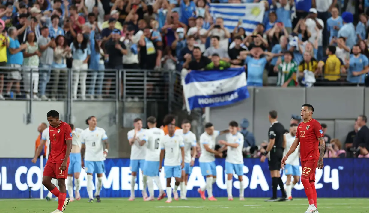 Mengalami kekalahan pada dua laga membuat posisi Bolivia terpuruk di dasar klasemen grup C Copa America 2024. (CHARLY TRIBALLEAU/AFP)