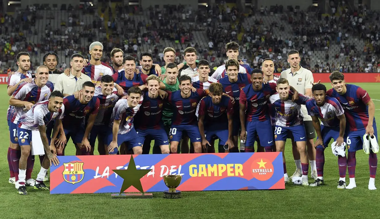 Dengan demikian, Barcelona memastikan kemenangan 4-2 atas Tottenham Hotspur. (Pau BARRENA/AFP)