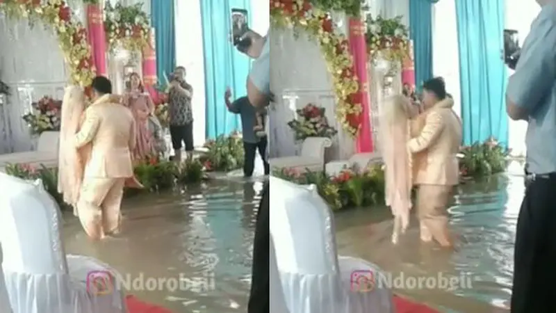 Gendong Istrinya Saat Banjir di Pelaminan, Perjuangan Pengantin Pria Viral