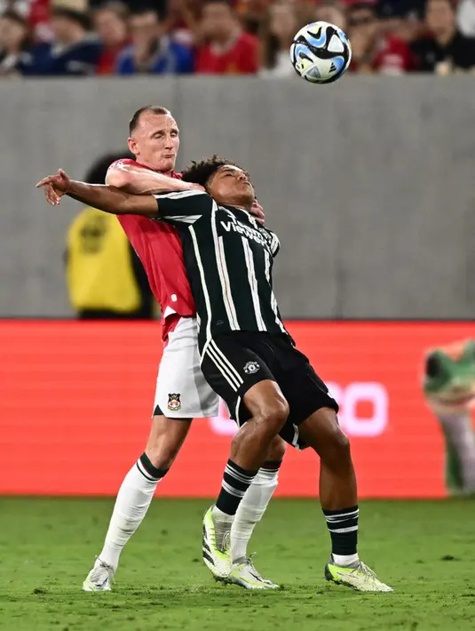 The Red Devils sempat membalas sebelum jeda dengan gol Marc Jurado. (Patrick T. Fallon/AFP)