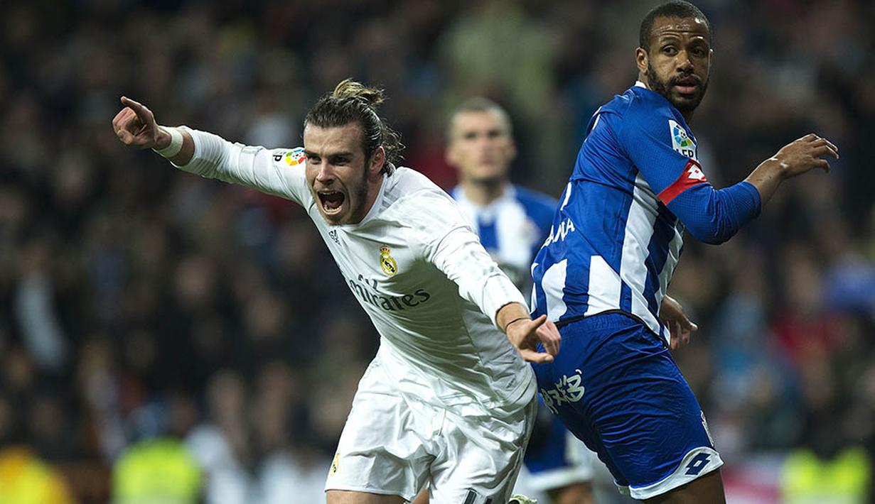Penuh semangat gelandang Real Madrid, Gareth Bale, merayakan gol yang dicetaknya ke gawang Deportivo pada laga La Liga Spanyol. Musim ini pria Wales itu sudah berhasil mencetak 12 gol di Liga Spanyol. (AFP/Gonzalo Arroyo)