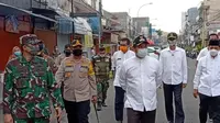 Tiga kepala daerah di Tangerang Raya sepakat memperpanjang kembali massa PSBB. (Pramita Tristiawati/Liputan6.com)