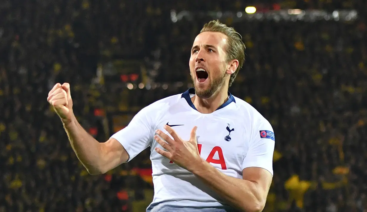 Selebrasi gol Harry Kane pada leg kedua, babak 16 besar Liga Champions yang berlangsung di Stadion Signal Iduna Park, Dortmund, Rabu (6/3). Tottenham Hotspur menang 1-0 atas Dortmund. (AFP/Bernd Thissen)