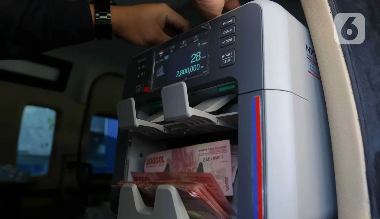 Sebelum melakukan penukaran uang baru melalui kas keliling BI, Anda wajib mendaftarkan diri di website PINTAR BI, https://pintar.bi.go.id/. (Liputan6.com/Herman Zakharia)