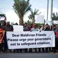 Warga Maldives (Maladewa) protes atas kedatangan Presiden Sri Lanka yang kabur ke negara mereka. (AFP)
