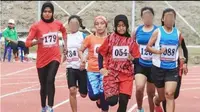 Pekan Olahraga Rakyat Aceh (PORA) XIII 2018 di Kota Jantho Kabupaten Aceh Besar yang berakhir Minggu, 25 November 2018, sempat mendapat cibiran karena ada sejumlah atlet tidak menutup aurat. (Liputan6.com/Rino Abonita)