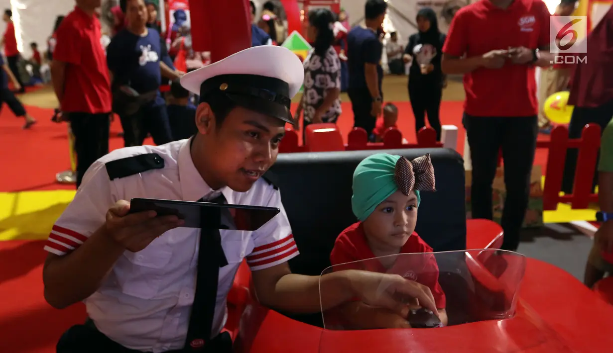 Anak-anak bermain saat peringatan Hari Anak Nasinonal di Taman Prestasi, Jakarta, Minggu (21/7/2019). Peringati Hari Anak Nasional SGM Eksplor hadirkan "Taman Prestasi Sahabat Generasi Maju" untuk mendukung asah potensi prestasi si Kecil Jadi anak Generasi Maju. (Liputan6.com/Johan Tallo)