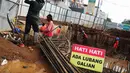  Balai Besar Ciliwung-Cisadane mengatakan proyek pembangunan sodetan Kali Ciliwung meleset dari target karena masalah pembebasan lahan masih belum bisa diselesaikan, Jakarta, Kamis (10/7/14). (Liputan6.com/Faizal Fanani)