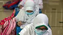 Anak-anak belajar mengaji di Masjid At-Taqwa, Jakarta, Rabu (14/4/2021). Pemerintah telah mengizinkan warga untuk melakukan ibadah di masjid dengan menerapkan protokol kesehatan. (Liputan6.com/Faizal Fanani)