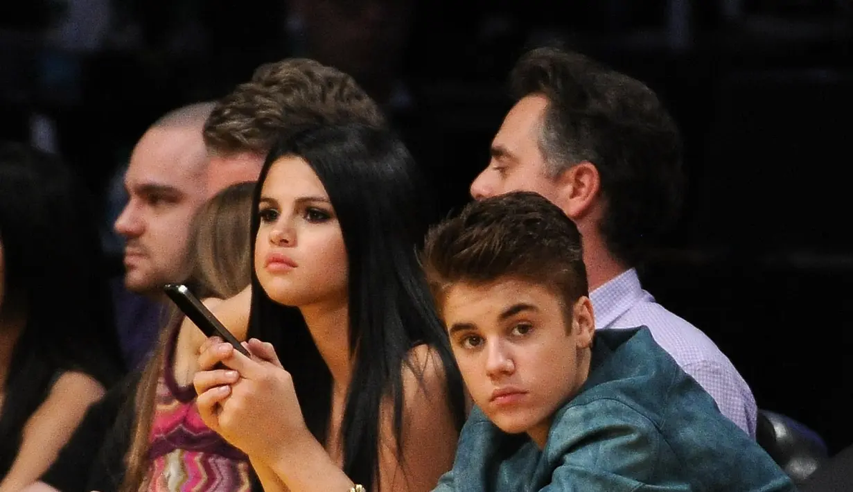 Selena Gomez nampaknya sudah cukup bosan dan muak ketika para awak media melontarkan pertanyaan yang menyangkut dirinya dan Justin Bieber. (AFP/Bintang.com)