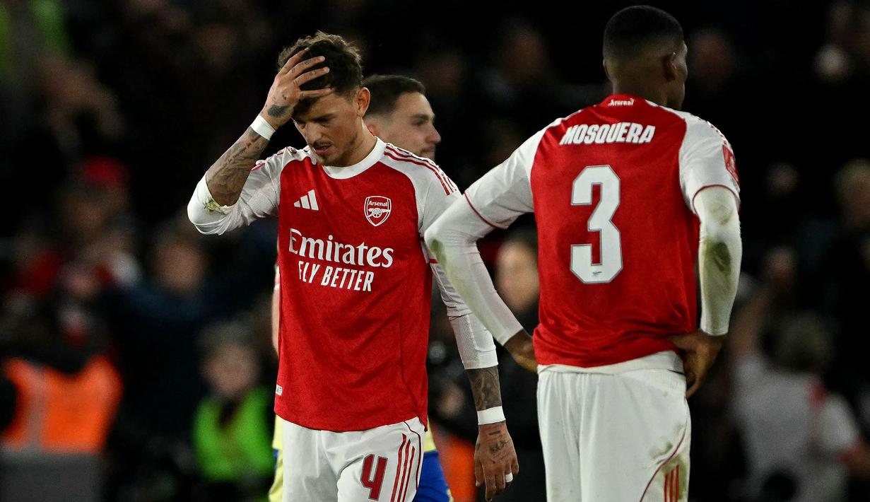 Kini, Arsenal hanya berpeluang untuk menambah trofi dari Liga Champions dan Liga Inggris. (AFP/Glyn Kirk)