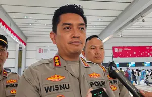 Polres Bandara Soetta Bagikan Masker dan Cek Kesehatan Calon Penumpang