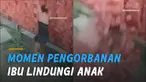 Gambaran sosok seorang ibu yang berani berkorban untuk anaknya terekam CCTV.