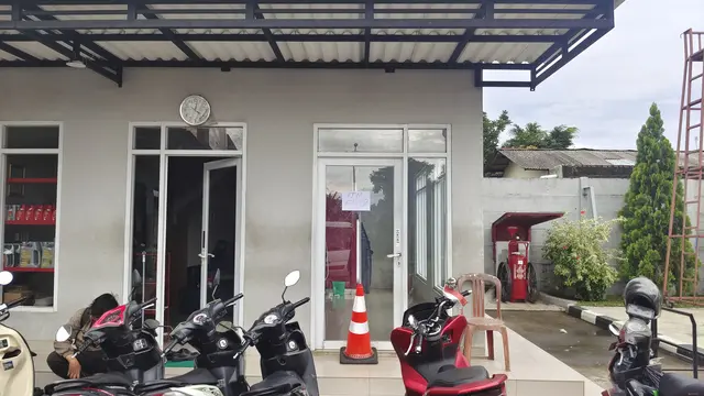 Lokasi pembobolan ATM yang diamankan Polsek Bojongsari di SPBU, Jalan Raya Pengasinan, Kecamatan Sawangan, Kota Depok.