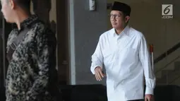 Ekspresi Menteri Agama (Menag) Lukman Hakim Saifuddin (Kemeja Putih) berjalan keluar usai menjalani pemeriksaan di Gedung KPK, Jakarta, Kamis(23/5/2019). Lukman Hakim Saifuddin diperiksa sebagai saksi untuk tersangka Anggota DPR RI nonkatif Muhammad Romahurmuziy. (merdeka.com/Dwi Narwoko)