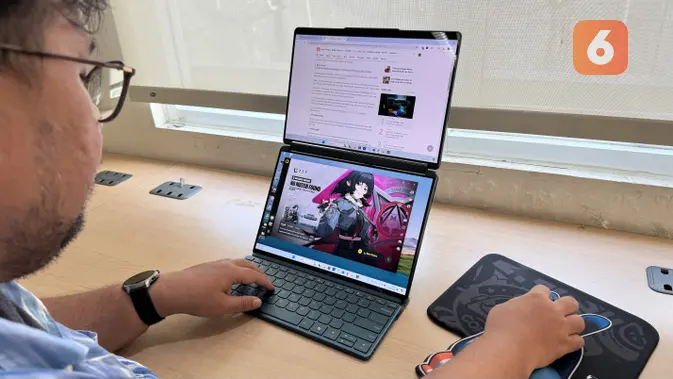 <p>Lenovo Yoga Book 9i juga bisa dipakai untuk bermain game. (Liputan6.com/ Agustinus Mario Damar)</p>