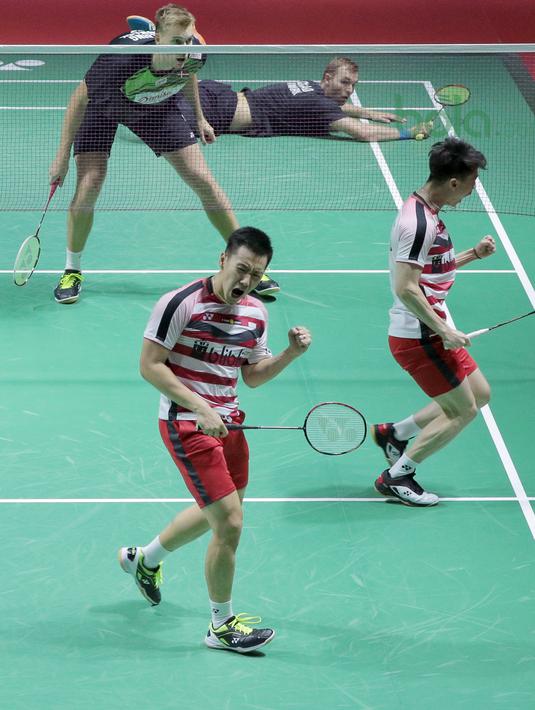 Ekspresi Kevin Sanjaya/Marcus Gideon saat kalahkan Mads Conrad/Mads Pieler pada perempat final Indonesia Open 2018 di Istora Senayan, Jakarta, (6/6/2018). Kevin/Marcus menang 20-22, 22-20, 21-18. (Bola.com/Nick Hanoatubun)