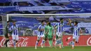 Pemain Real Sociedad, Mikel Merino, melakukan selebrasi usai membobol gawang Real Madrid pada laga La Liga di Reale Seguros Stadium, Minggu (21/6/2020). Real Madrid menang 2-1 atas Real Sociedad. (AP Photo/Alvaro Barrientos)