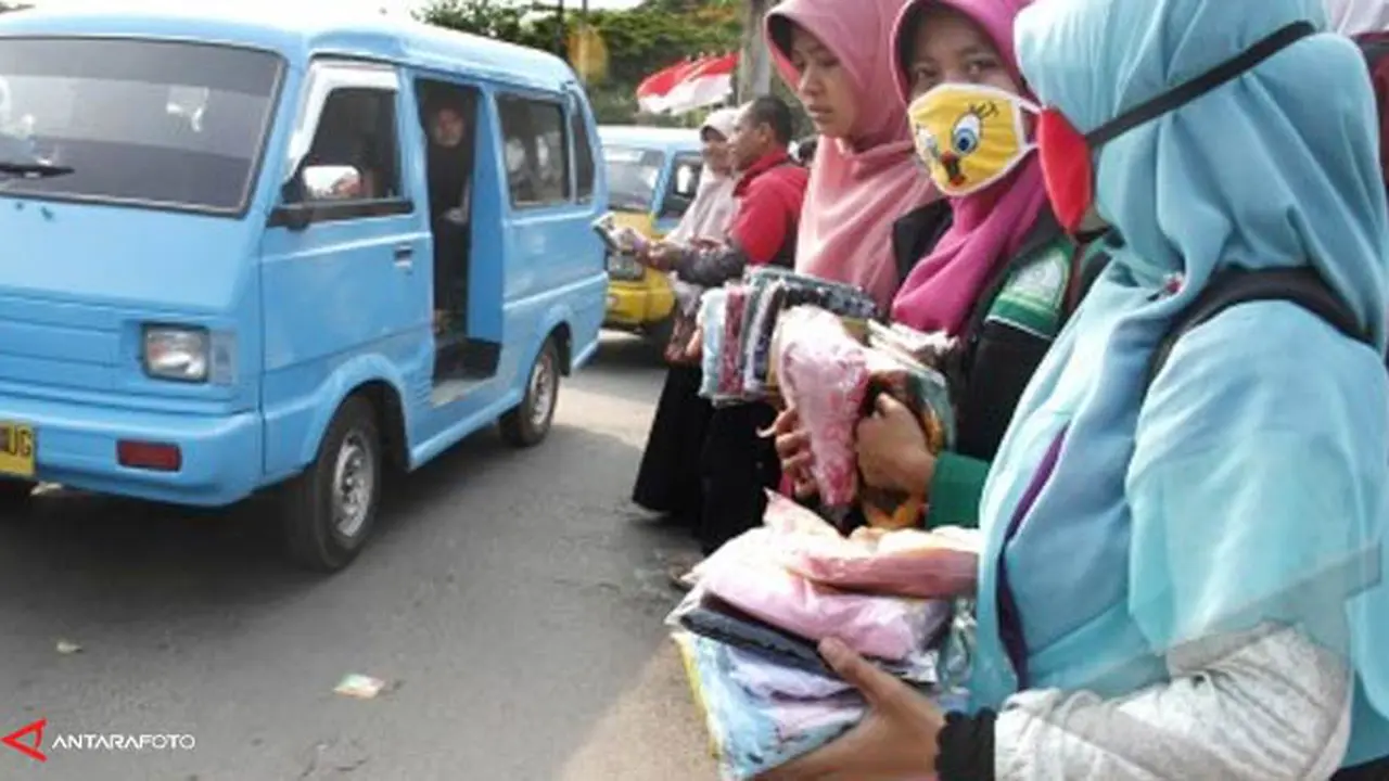 bagi-jilbab-140215a.jpg