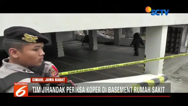 Tim penjinak bom periksa koper mencurigakan yang ditemukan di basement Rumah Sakit Mitra Kasih Cimahi.