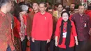 Presiden Jokowi didampingi Ketum PDIP Megawati Soekarnoputri saat menghadiri Rakornas Tiga Pilar PDI Perjuangan di ICE BSD, Tangerang Selatan, Sabtu (16/12). (Liputan6.com/Angga Yuniar)