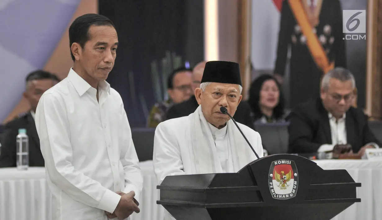 Pasangan Presiden dan Wapres terpilih, Joko Widodo atau Jokowi dan Ma'ruf Amin memberikan sambutan pada Rapat Pleno Terbuka Penetapan Presiden dan Wakil Presiden Terpilih Pemilu 2019 di Gedung KPU, Jakarta, Minggu (30/6/2019). (merdeka.com/Iqbal S Nugroho)