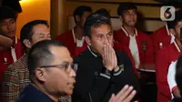 Ekspresi pelatih tim nasional Indonesia U-17, Bima Sakti saat menyaksikan tayangan acara pengundian pembagian grup Piala Dunia U-17 yang digelar Zurich, Swiss, Jumat (15/9/2023) malam. (Liputan6.com/Helmi Fithriansyah)