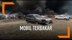 Sedikitnya 300 mobil terbakar di arena pameran dirgantara di India. Api diduga berasal dari rumput kering yang terbakar.