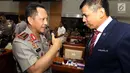 Kapolri Jenderal Pol Tito Karnavian usai mengikuti rapat kerja dengan Komisi III DPR di Kompleks Parlemen Senayan, Jakarta, Rabu (14/3). Rapat membahas persiapan Polri dalam pengamanan Pilkada Serentak 2018. (Liputan6.com/Johan Tallo)