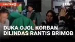 Jenazah Afan Kurniawan, pengemudi ojek daring yang tewas terlindas kendaraan taktis Brimob, dibawa pulang keluarga dari RSCM Jumat dini hari. Rekan-rekan sesama pengojek daring ikut mengiringi almarhum ke rumah duka di Menteng, sebelum dimakamkan di ...