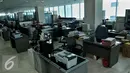 Suasana ruang kerja lingkungan Pemerintah Provinsi DKI Jakarta di kantor Balai Kota, Rabu, (22/7/2015). Sejumlah meja masih terlihat kosong pasca Idul Fitri 1436H, hal ini dikarenakan beberapa PNS mengambil cuti tahunan. (Liputan6.com/Johan Tallo)