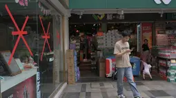 Pemerintah China memerintahkan setidaknya 10 kota untuk menutup sekolah dan bisnis, seiring dengan mendekatnya Topan Super Ragasa ke wilayah selatan negara tersebut. (Adek BERRY/AFP)