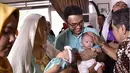 Pasangan selebriti, Cynthia Lamusu dan Surya Saputra baru saja menggelar acara aqiqah anak kembarnya, Tatjana dan Bima. Acara berlangsung lancar sederhana dan khidmat.(Instagram/cynthia_lamusu)