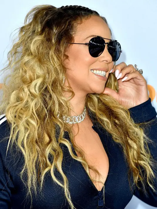 Terkait berat badannya yang semakin membesar, ternyata Mariah khawatir jika kekasihnya, Bryan Tanaka meninggalkan dirinya dan kemudian berpaling ke wanita lain. (AFP/Bintang.com)