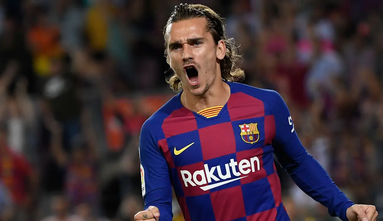 7. Antoine Griezmann (Barcelona) - Pemain berusia 28 tahun ini memiliki Kecepatan 86, Dribel 83, Umpan 84, Tembakan 88, Fisik 72, Kemampuan Bertahan 55, OVR 90. (AFP/Lluis Gene)