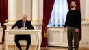 Presiden Joe Biden (kiri) menandatangani buku tamu dalam pertemuan dengan Presiden Ukraina Volodymyr Zelensky di Istana Mariinsky, Kyiv, Ukraina pada 20 Februari 2023. Presiden AS Joe Biden melakukan kunjungan mendadak ke Kyiv menjelang peringatan satu tahun invasi Rusia ke Ukraina. Biden bertemu dengan Presiden Ukraina Volodymyr Zelensky di ibu kota Ukraina dalam kunjungan pertamanya ke negara itu sejak dimulainya konflik. (Evan Vucci/POOL/AFP)