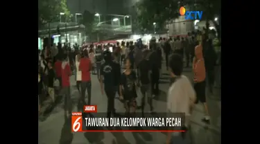 Tawuran ini terjadi antara warga yang hanya dibatasi halte busway, yakni warga Menteng Tenggulun dengan warga Pasar Rumput.