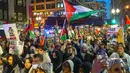 Di Amerika Serikat, para pendukung Israel dan pendukung perjuangan Palestina mengadakan demonstrasi yang saling bersaing di beberapa kota di Amerika Serikat. (Tyler Pasciak LaRiviere/Chicago Sun-Times via AP)