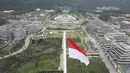 Foto udara yang diambil pada 14 Agustus 2025 ini menunjukkan Istana Kepresidenan dan gedung-gedung kementerian pemerintah yang sedang dalam tahap pembangunan di Ibu Kota Nusantara (IKN), ibu kota baru Indonesia yang direncanakan, di Kalimantan Timur. (Foto oleh AFP)