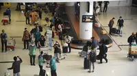 Suasana di kedatangan Bandara SAMS Sepinggan Balikpapan. (Liputan6.com)