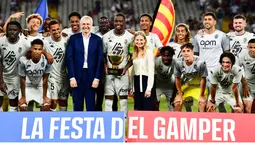 Pemain AS Monaco melakukan selebrasi setelah menjuarai laga pramusim bertajuk Joan Gamper Trophy di Estadi Olimpic Lluis Companys, Selasa (13/8/2024) dini hari WIB. (AFP/Manaure Quintero)