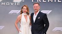 Christian Horner (kanan) bersama sang istri yang juga penyanyi, Geri Halliwell. (ANGELA WEISS / AFP)
