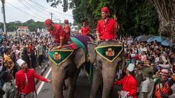 Keraton Yogyakarta menggelar prosesi Grebeg Maulud, salah satu budaya Yogyakarta yang rutin dilakukan dalam rangka memperingati hari kelahiran Nabi Muhammad SAW. (DEVI RAHMAN/AFP)