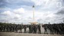 Prajurit TNI AD mengikuti Apel Gelar Pasukan Jajaran TNI AD di Lapangan Monas, Jakarta, Selasa (25/1/2022). Pasukan TNI AD dan Alutsista dipamerkan saat mengikuti gelar apel pasukan. (Liputan6.com/Faizal Fanani)