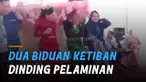 Dinding dekorasi pelaminan yang terbuat dari kayu roboh dari atas panggung dan langsung menimpa kepala kedua biduan tersebut.