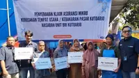 BRI Insurance Serahkan Klaim ke Pedagang Pasar Kutoarjo Korban Kebakaran, Ini Nilainya
