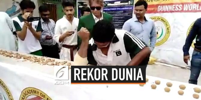 VIDEO: Rekor Dunia, Pria Hancurkan Ratusan Kenari dengan Siku