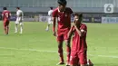 Pemain depan Timnas U-17 Indonesia, M Nabil Asyura (kanan) merayakan golnya ke gawang timnas Uni Emirat Arab pada laga Kualifikasi Grup C Piala Asia U-17 2023 di Stadion Pakansari, Kab. Bogor, Jawa Barat, Rabu (5/10/2022). Laga kedua tim berlangsung sengit dan berakhir untuk keunggulan Timnas U-17 Indonesia dengan skor 3-2. (Liputan6.com/Helmi Fithriansyah)